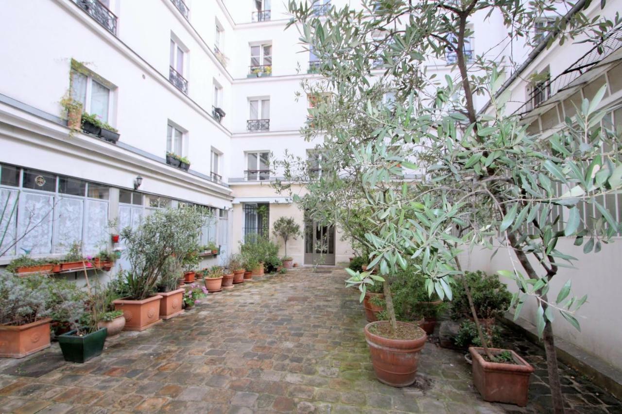 Superbe Appartement Parigi Esterno foto