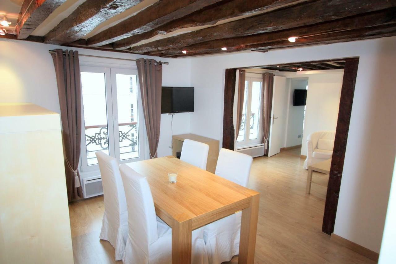 Superbe Appartement Parigi Esterno foto